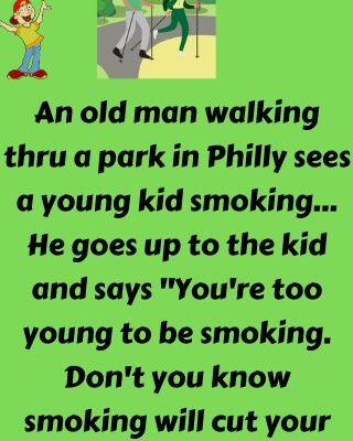 An old man walking thru a park